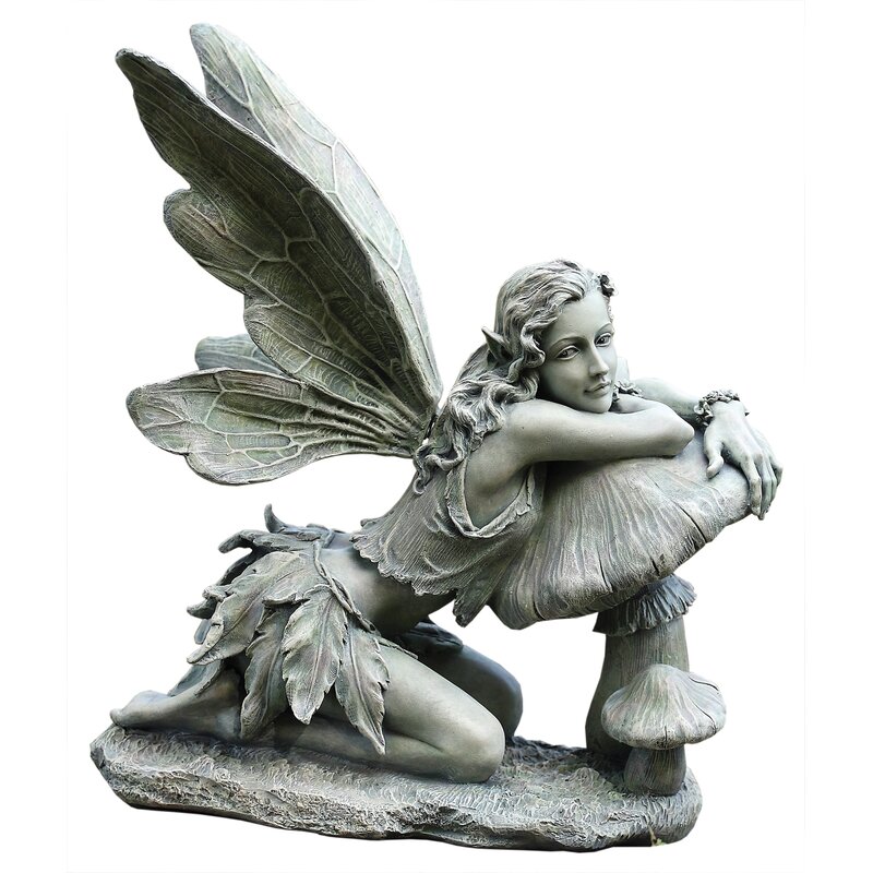 fairy on mushroom statue